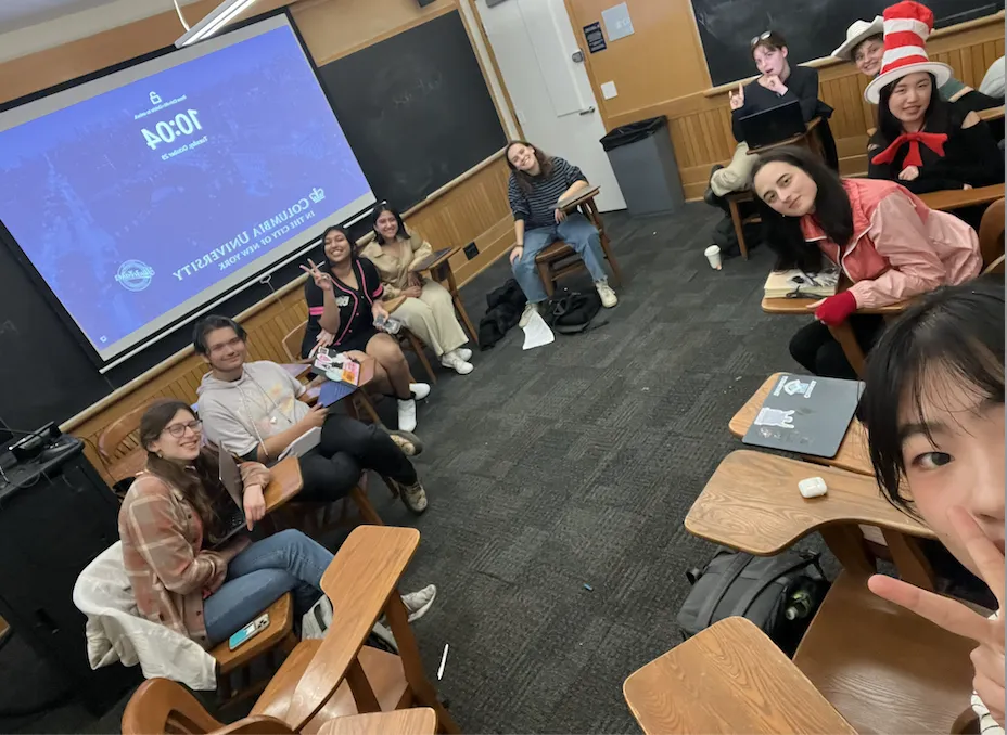 Halloween inspired writing workshop, people are in costumes and worked on spooky poetry. 